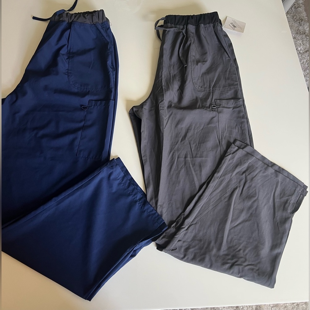NWT. Set of 2 sports pants for men size XL. Gray and navy blue color